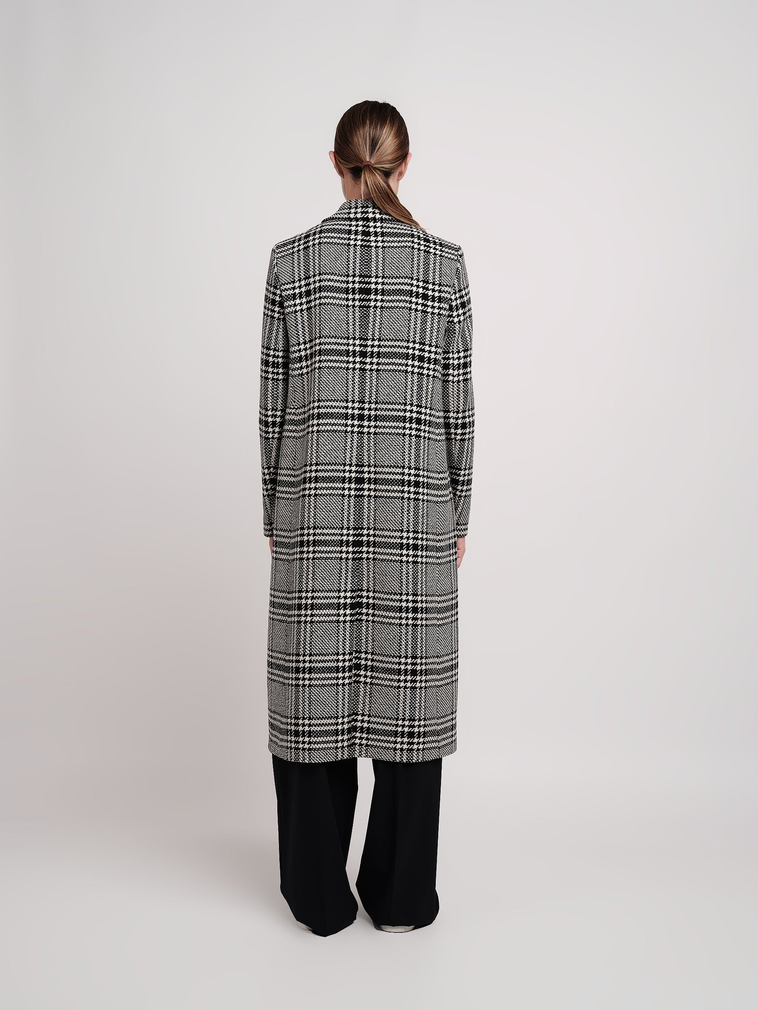 Double-breasted coat in black and white wool maxi wales