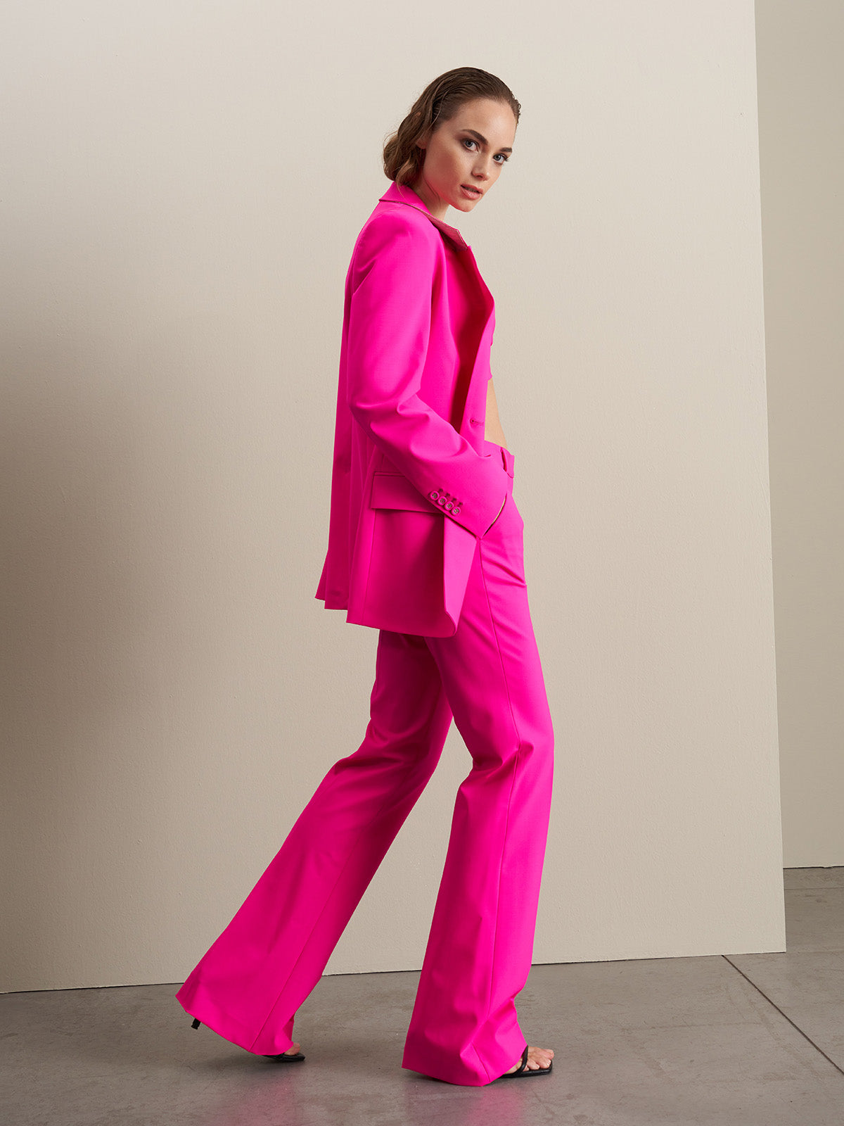 Pantalone a zampa in lana fucsia