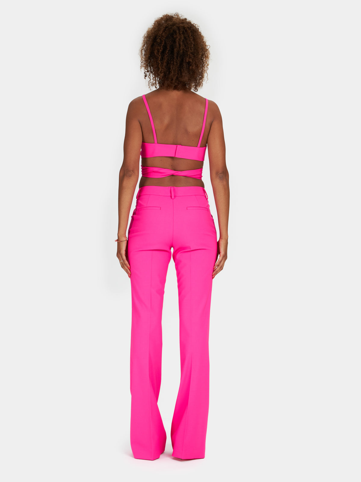 Pantalone a zampa in lana fucsia